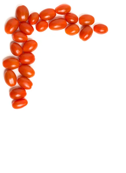Cherry tomatoes as a corner of frame — Stock Photo, Image