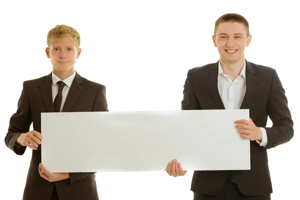 Grupa dwóch businesspersons trzymając transparent blanc — Zdjęcie stockowe