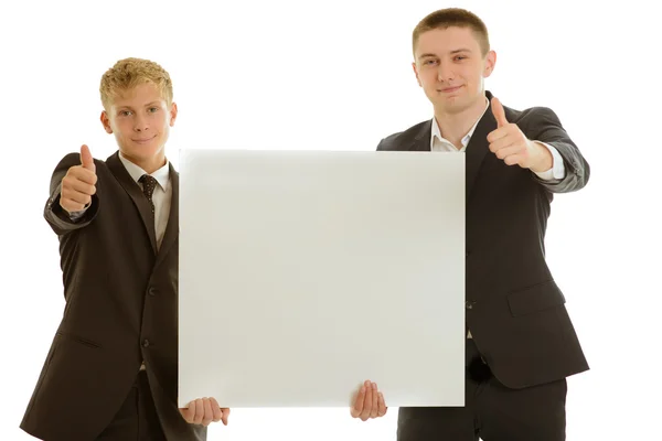 Group of two businesspersons holding blanc banner — Stock Photo, Image