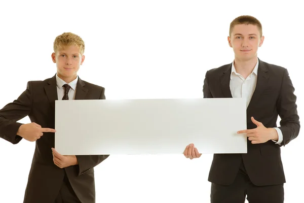 Group of two businesspersons holding blanc banner — Stock Photo, Image