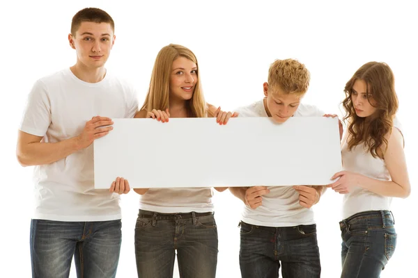 Group beautiful of happy young people with ad — Stock Photo, Image