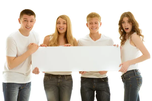 Group beautiful of happy young people with ad — Stock Photo, Image