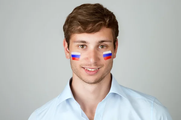 Красивий зображений юнаком iз прапор Росії живопису в обличчя — стокове фото