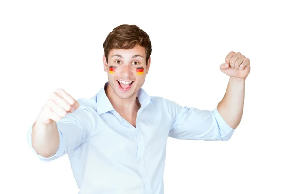 Футбольный болельщик с германским флагом окрашенный в лицо радость победу — стоковое фото