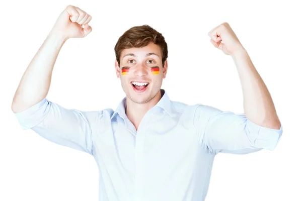 Футбольный болельщик с германским флагом окрашенный в лицо радость победы — стоковое фото