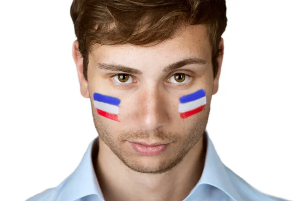Футбольний вболівальник з Нідерландів прапор пофарбовані в обличчя — стокове фото