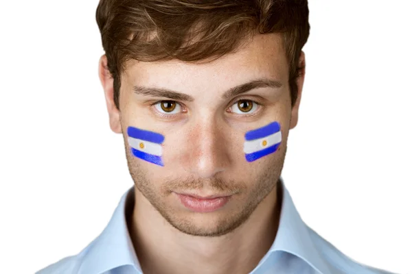 Футбольний фанат з прапором Аргентини, намальованим на обличчі — стокове фото