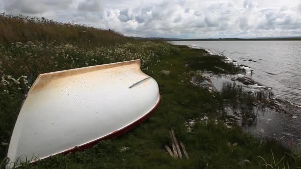 A view of a boat by the Harray Loch, Orkney, Scotland — Stock Video