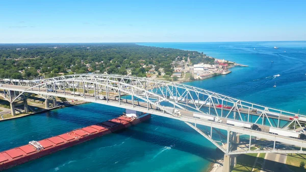An aerial of the Blue Water Bridge and Lake Freighter in Sarnia, Canada