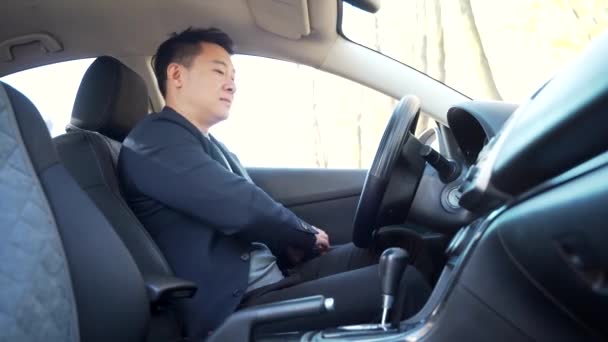 Asian Male Driver Fastens Seat Belt Sitting Car Protection Person — Video Stock