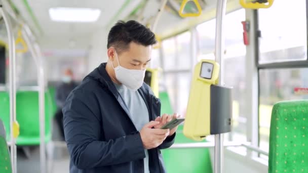 Asian Man Paying Public City Transport Mobile Phone App Male — стоковое видео