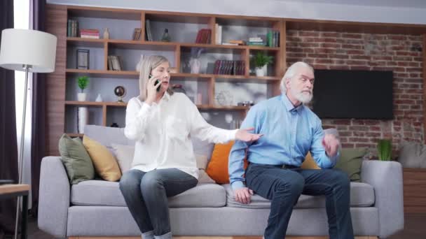 Senior Married Couple Quarreling Gray Haired Man Woman Sitting Sofa — Wideo stockowe