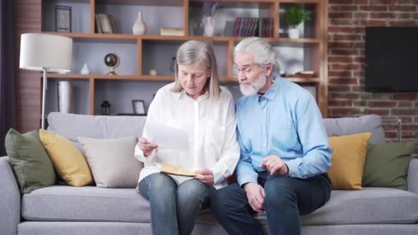 Senior Gray Haired Family Member Receiving Letter Document Rejoicing Sitting — Stock Video