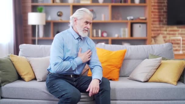 Grey Haired Older Senior Man Suffering Severe Heart Pain Holds — Vídeo de stock