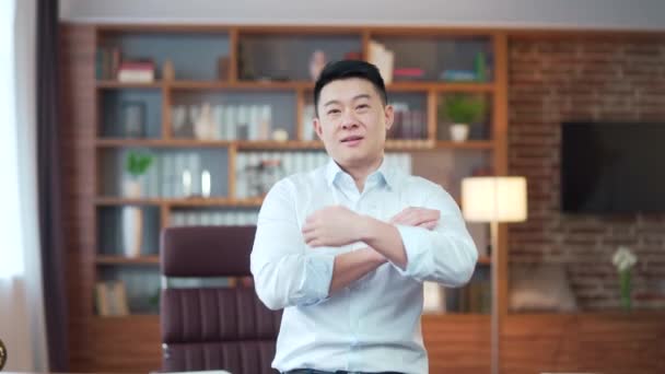 Portrait Happy Cheerful Proud Asian Businessman Employee Looks Camera Arms — Vídeo de stock