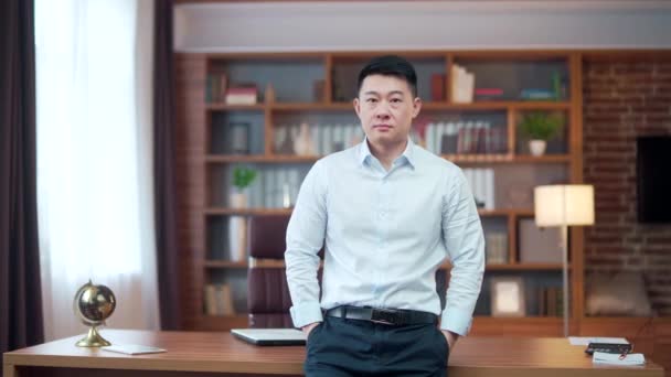 Close Portrait Serious Confident Asian Guy Employee Entrepreneur Office Worker — стоковое видео