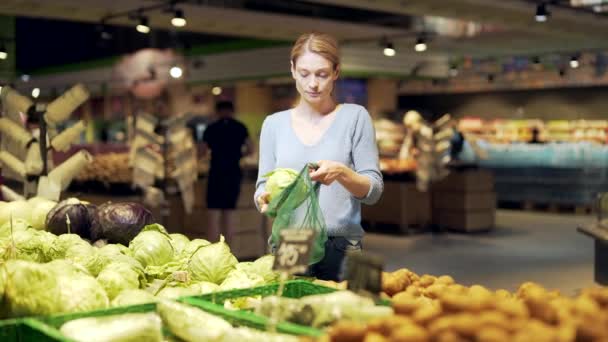 Young Woman Chooses Picks Inspect Vegetables Cabbage Fruits Supermarket Female — Vídeo de Stock