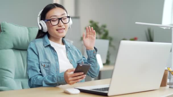 Young Stylish Asian Woman Employee Office Worker Listen Music Headphones — Stock video