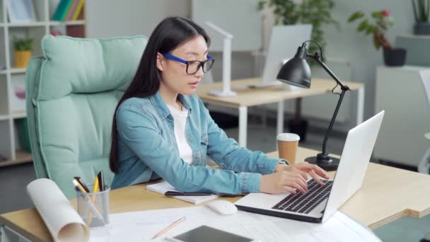 Young Creative Asian Woman Modern Designer Architect Sitting Desk Computer — Video