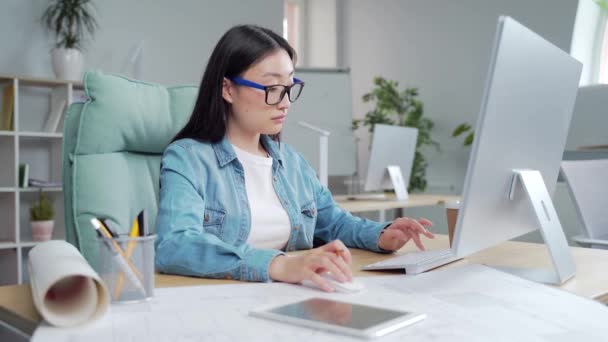 Young Creative Asian Woman Modern Designer Architect Sitting Desk Computer — Video
