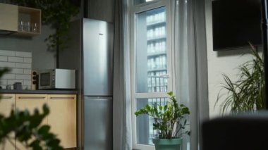 Burglar robber break door lock and entering building apartment. house robbery, Home Burglary. intruder or thief with crowbar in black clothes stealing break door to enter the private property indoor