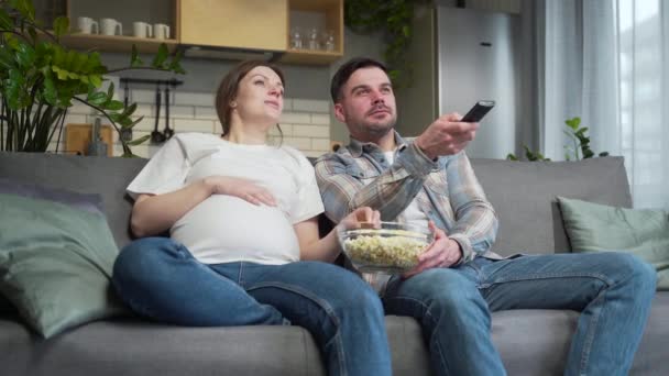 Bored Couple Home Choose Television Show Watch Switch Channels Remote — Stockvideo