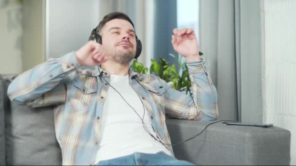 Happy Young Bearded Cheerful Handsome Caucasian Man Enjoying Listening Music — Stock video