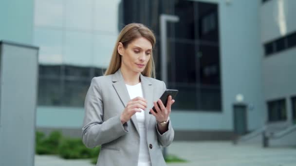 Happy Business Woman Employee Using Smartphone Smiling Formal Suit Businesswoman — Stockvideo