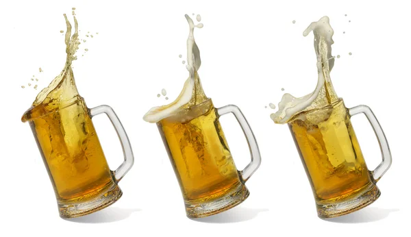 Bicchiere cadente di birra Immagini Stock Royalty Free