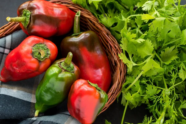 Some Fresh Red Chili Pepper Basket Fresh Coriander Black Wooden — Stockfoto