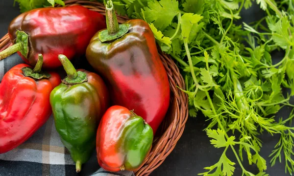 Some Fresh Red Chili Pepper Basket Fresh Coriander Black Wooden — Stockfoto