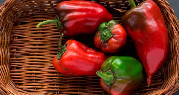 Some Fresh Red Chili Pepper Basket Black Wooden Table — Stockfoto