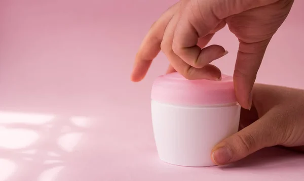 Hand Opening Skin Cream Bottle Women Pink Background — Stock Photo, Image