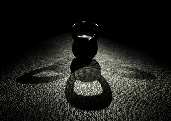 Kettle bell work shadow — Stock Photo, Image