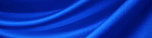 Синий Шелковый Атласный Занавес Крупный План Мягкие Волнистые Складки Блестящей — стоковое фото