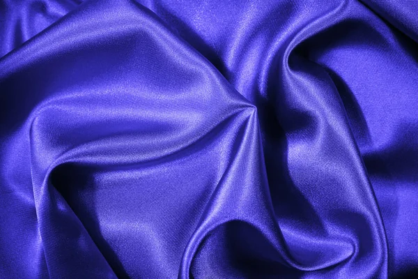 パープルブルーのシルクサテン 美しい柔らかい折り目 光沢のある生地の表面 デザインのためのスペースとエレガントな絹のような背景 — ストック写真