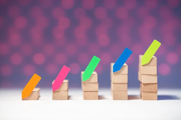 Gráfico de madera con fondo colorido y pegatina —  Fotos de Stock