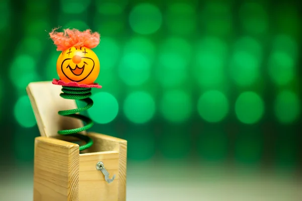 Little clown surprize from wood box — Stock Image Little clown surprize from wood box Royalty Free Stock Photos