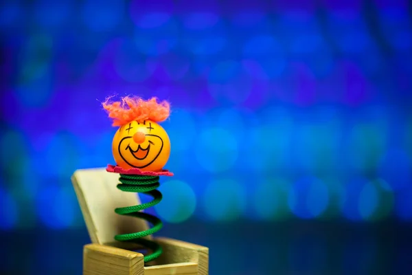 Little clown surprize from wood box — Stock Image Little clown surprize from wood box Royalty Free Stock Images