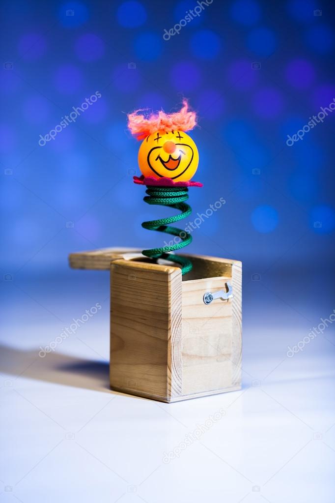 Little clown surprize from wood box