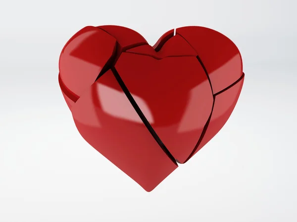 Red broken heart om white background — Stock Photo, Image