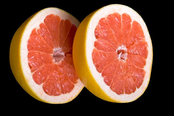 Red halved grapefruit — Stockfoto