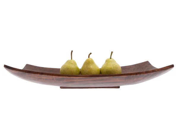 Päron på tallrik — Stockfoto