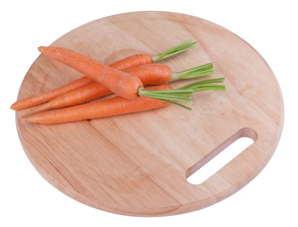 Carrots on a chopping board — Stock Photo, Image