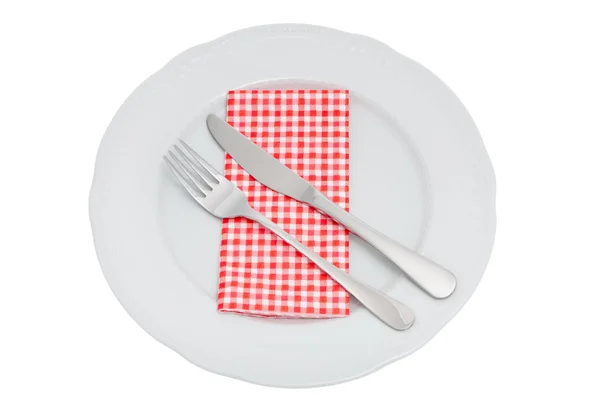 Knife and fork on a plate — Stock Photo, Image