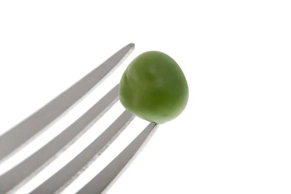 Green pea with fork — Stock Photo, Image