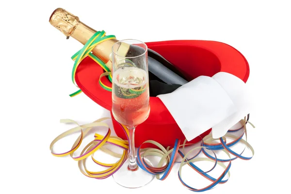 Red top hat with champagne and glass — Stock Photo, Image
