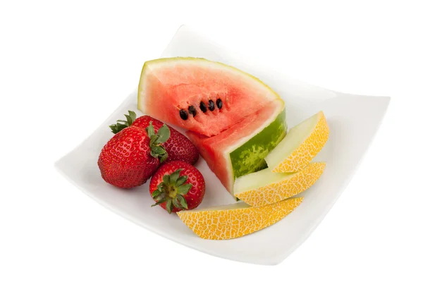 Fruits on a plate with clipping path — Stock Photo, Image