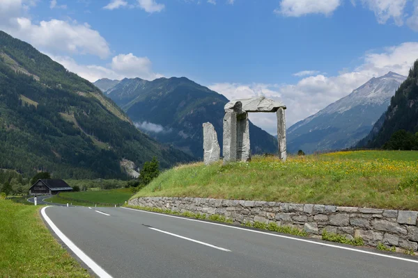 Stone arch with mountains — Stock Photo, Image