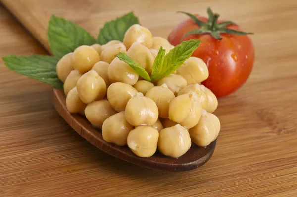 Chickpeas and tomato — Stock Photo, Image